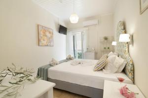 Postel nebo postele na pokoji v ubytování M2 room