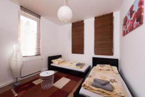 Posteľ alebo postele v izbe v ubytovaní Zora's apartment