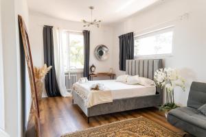 Posteľ alebo postele v izbe v ubytovaní Villa Tropical + 37 fotografií