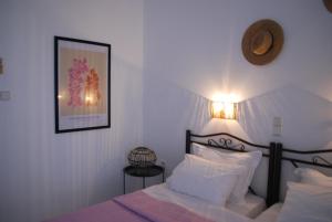 Postel nebo postele na pokoji v ubytování Sunset Rooms + 74 fotografií