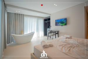 Postel nebo postele na pokoji v ubytování DREAM HOTEL SARANDA