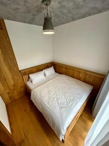 Postel nebo postele na pokoji v ubytování Apartmány POCO LOCO