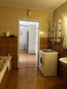 Kúpeľňa v ubytovaní Apartamenty Centrum