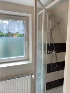 Kúpeľňa v ubytovaní Willa Jagiellonka apartamenty w centrum, parking + 37 fotografií
