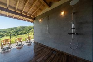 Balkón nebo terasa v ubytování THE TANADA SAUNA サウナ 露天風呂 棚田一望 Refaシャワードライヤー 食事追加可
