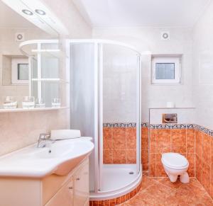Koupelna v ubytování Apartments Šuster