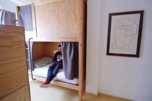 Cama ou camas em um quarto em WOT Lisbon Nomad