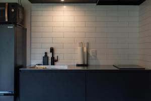 Kuchyň nebo kuchyňský kout v ubytování THE TANADA SAUNA サウナ 露天風呂 棚田一望 Refaシャワードライヤー 食事追加可