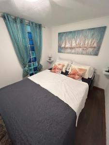 Ένα ή περισσότερα κρεβάτια σε δωμάτιο στο Apartman Mornar