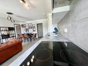 Photo de la galerie de l'établissement Élégant T3 tout confort, à Saint Pierre en Faucigny 16 autres photos