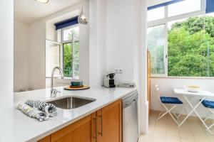 Køkken eller tekøkken på GuestReady - Cosy flat Santos-o-Velho + 7 billeder