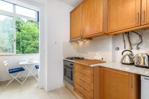 Køkken eller tekøkken på GuestReady - Cosy flat Santos-o-Velho