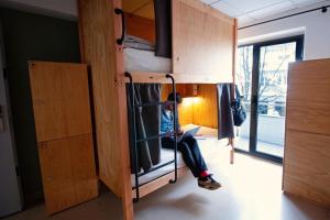 Cama ou camas em um quarto em WOT Lisbon Nomad