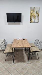 TV a/nebo společenská místnost v ubytování Apartman SPLENDID