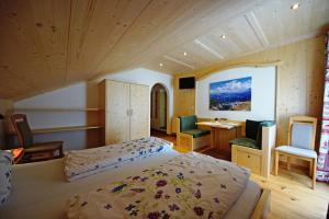 Posteľ alebo postele v izbe v ubytovaní Agriturismo Lüch de Vanc