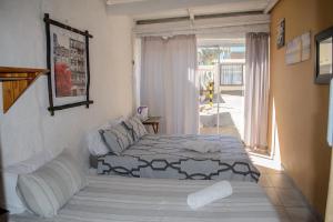 Postel nebo postele na pokoji v ubytování Element Riders Place Backpackers