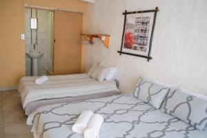 Postel nebo postele na pokoji v ubytování Element Riders Place Backpackers