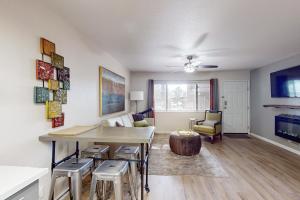 a kitchen and living room with a table and chairs at Sedona Sunrise II Holiday in Sedona