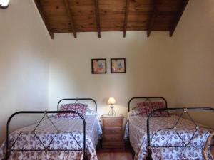 เตียงในห้องที่ Masca - Casa Rural Morrocatana - Tenerife