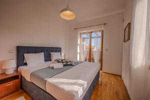 Postel nebo postele na pokoji v ubytování Villa Sonne in Paradis