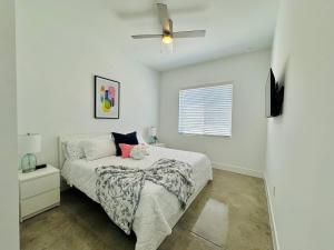 Voodi või voodid majutusasutuse The Pickleball Haven of Naples - Scarlet Dream toas +37 fotot