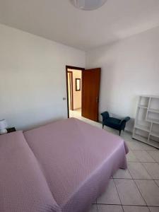 Postel nebo postele na pokoji v ubytování Sunshine Alloggio turistico
