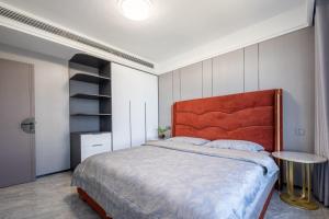 Postel nebo postele na pokoji v ubytování Cloud & Sea Boutique Apartment