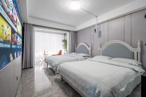 Postel nebo postele na pokoji v ubytování Cloud & Sea Boutique Apartment