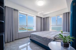 Postel nebo postele na pokoji v ubytování Cloud & Sea Boutique Apartment