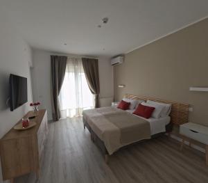 Postel nebo postele na pokoji v ubytování Villa Capodacqua