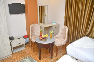 TV a/nebo společenská místnost v ubytování Nun Pyramids Hotel