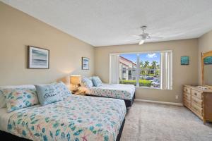 Ένα ή περισσότερα κρεβάτια σε δωμάτιο στο St Pete Isla Vista Verde E 4-229 New Kitchen +23 φωτογραφίες
