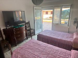 Postel nebo postele na pokoji v ubytování Casa javi etxea
