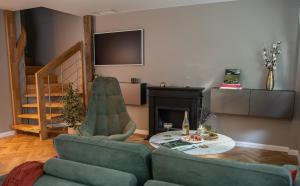 Posezení v ubytování Villa Trianon Gîte 5 étoiles avec spa privé forêt Villandry