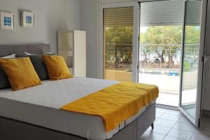 Postel nebo postele na pokoji v ubytování Allure Loft
