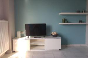 TV a/nebo společenská místnost v ubytování Allure Loft