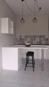 Kuchyň nebo kuchyňský kout v ubytování Allure Loft