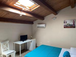 TV a/nebo společenská místnost v ubytování B&b Asterios