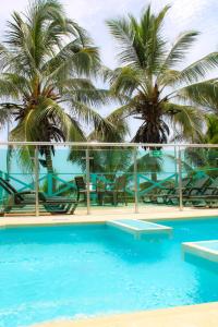 Bazén v ubytování Hotel San Andres Arboletes nebo v jeho okolí
