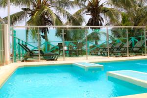 Bazén v ubytování Hotel San Andres Arboletes nebo v jeho okolí