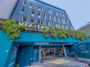 a blue building with a sign on it at Viajero Buenos Aires Hostel in Buenos Aires