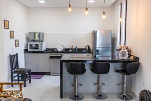 Η κουζίνα ή μικρή κουζίνα στο Casa próx às 3 fronteiras e a 20min das Cataratas