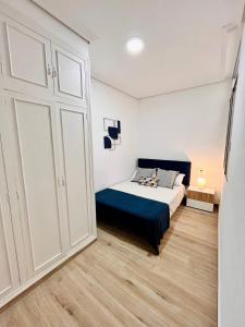 Postel nebo postele na pokoji v ubytování New central Residencie