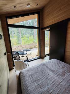 En eller flere senge i et værelse på Villa Saaga, Äkäslompolo, Ylläs