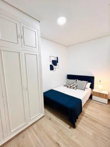 Postel nebo postele na pokoji v ubytování New central Residencie