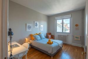 Ένα ή περισσότερα κρεβάτια σε δωμάτιο στο Le Constantine - Paix & Lumière