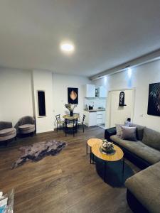 Χώρος καθιστικού στο Gianni's Apartments