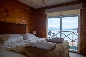 Postel nebo postele na pokoji v ubytování Parque Llanquihue - Caja los Héroes