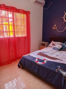 Postel nebo postele na pokoji v ubytování La casa Amelia Nueva Gorgona + 16 fotografií