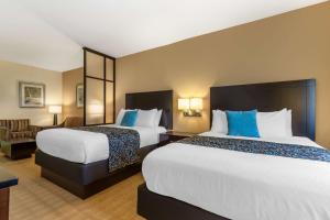 Postel nebo postele na pokoji v ubytování Best Western Plus Lytle Inn and Suites